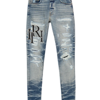 Amiri Staggered Logo Jeans Vintage Indigo